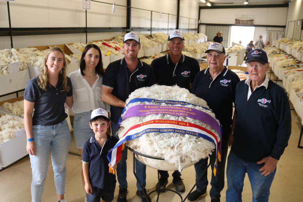With the grand champion and champion strong wool fleece of Woolorama were sponsor Tayla MacQueen (left), Country Wide Insurance Brokers (CWIB) assistant account manager Narrogin and winning connections from the Kolindale stud, Dudinin, Daniela, Louis, 6, and Luke Ledwith, Mathew Ledwith, Colin Lewis and Arthur Major.
