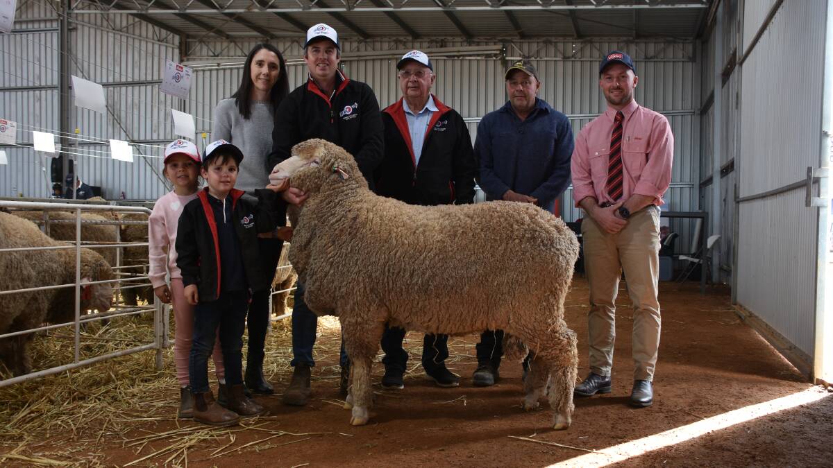 With the $7000 top-priced Poll Merino ram at the Kolindale on-property ram sale at Dudinin on Monday were Kolindale stud co-principals Daniela Varone (left) and Luke Ledwith with niece Lucy Hunter and son Louis, Kolindale representative Colin Lewis, buyer Noel Brayshaw, E Brayshaw & Son, Narembeen and Elders auctioneer James Culleton.
