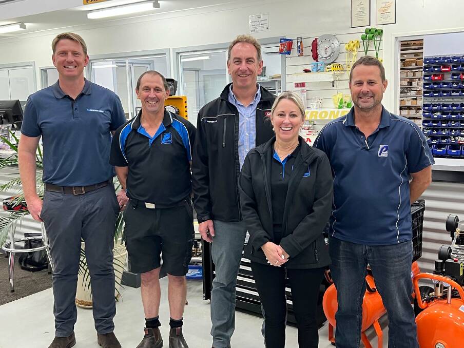 McIntosh Group chief executive officer David Capper (left) and McIntosh & Son general manager of its southern dealership group Devon Gilmour (centre), with Perkins Machinery, Narrogin, directors, dealer principal Shane Perkins (second left), Jo West and Chris Perkins.
