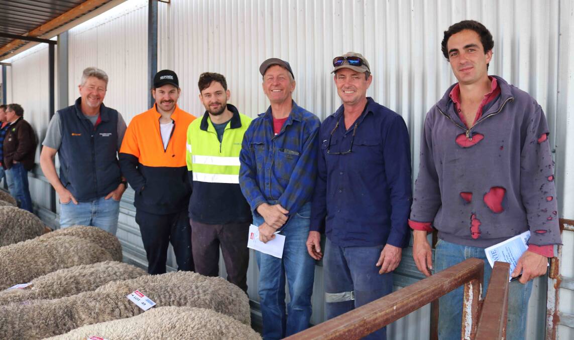 Gordon (left), Liam, Connor and John McDougall, all from Tincurrin, caught up with Jamie and Matt Dare, Dumbleyung, at the Nepowie on-property ram sale.
