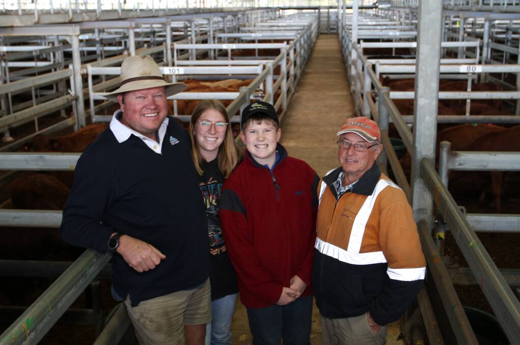 Kerrin (left), Emily and Calvin Hardy and Bruce Palmer, Stockdale Farms, Merredin, purchased 60 Georgina Farms Red Angus cross heifers at the sale bidding to 262c/kg.
