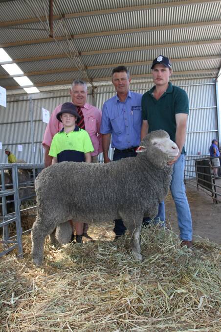 Poll Merino ram prices topped at $5800 at the Angenup sale for this ram that was purchased by long-time buyers WB & BM Schulz, Williams. With the May shorn paddock run ram were Manton Schulz (left), WB & BM Schulz, Elders state commercial sheep manager Wayne Peake and Gavin and Lachy Norrish, Angenup stud, Kojonup.