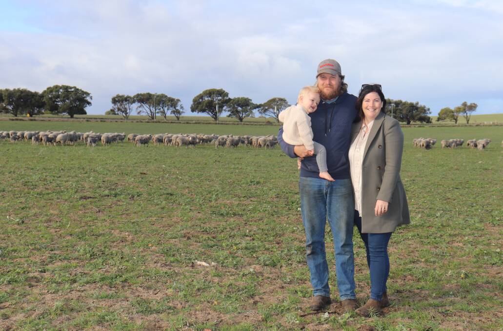 Joe Dewar, his wife Jess and their son William. The Dewars are known for producing quality Angus sires at their Ardcairnie Angus stud, Guilderton, but are proving that incorporating a commercial Merino flock into their enterprise can be a productive and worthwhile choice for producers.
