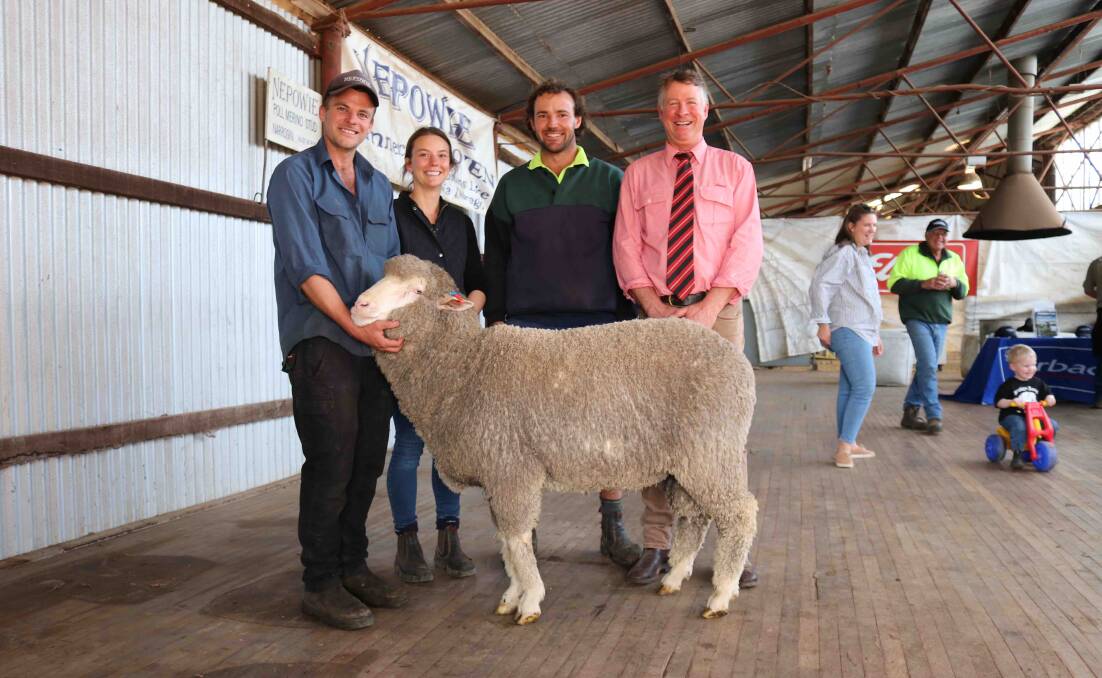 Nepowie stud co-principal Blake White (left), Nomans Lake, buyers Sam and Luke Blechynden, Blechynden Farming Enterprises, Aldersyde, and Jeff Brown, Elders stud stock, with the $6000 top-priced ram at the Nepowie on-property ram sale last week.

