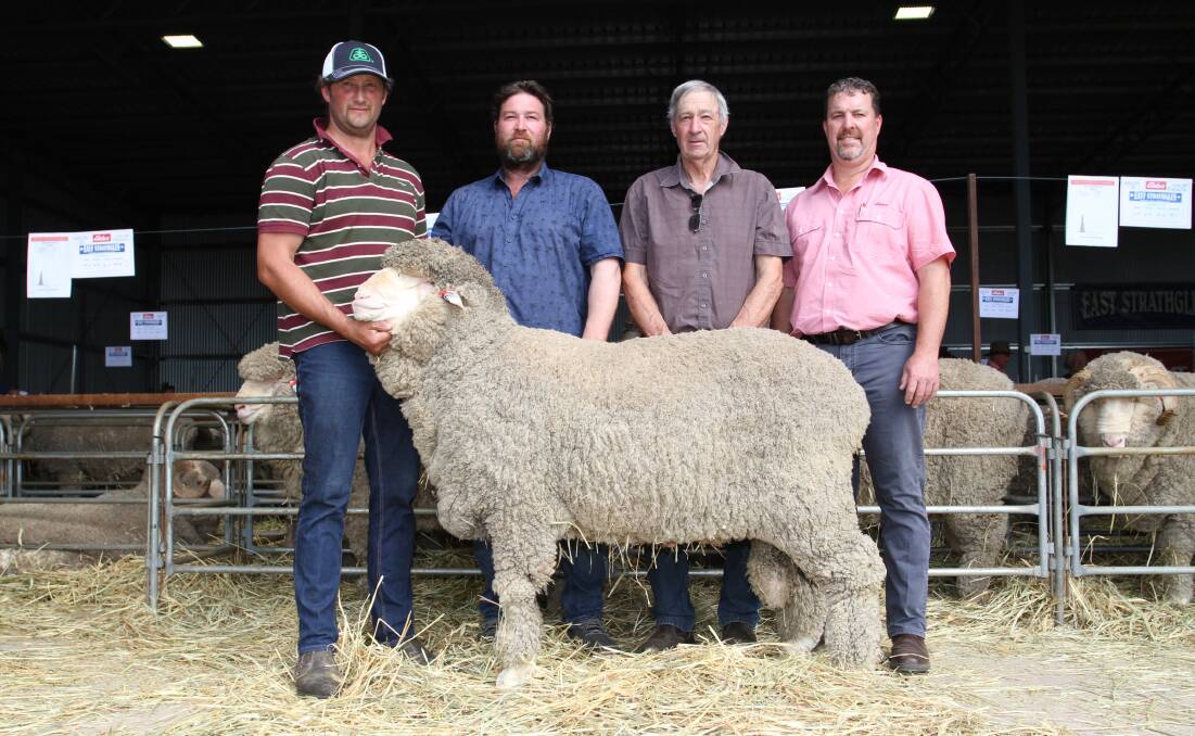  East Strathglen stud principal Rohan Sprigg (left), Tambellup, buyers Murray and Gerald Saunders, A Saunders & Co, Highbury, and Elders stud stock representative Nathan King with the $5000 top-priced Poll Merino ram at the East Strathglen sale.
