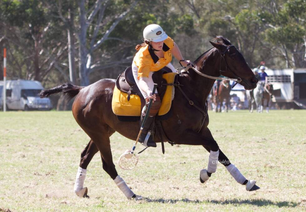 Hannah Rutley in action on the polocrosse field, she is heading to the national polocrosse event later this year. Photos by Waddygirls Photography.
