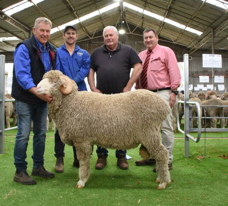 This Merino ram sold for the $6400 equal top price at last week's Barloo/Willemenup on-property ram sale at Gnowangerup to the Gaze family, Kebaringup Farm, Gnowangerup.With the ram were Barloo co-principals Richard (left) and Fraser House, the Gaze's classer Kevin Broad, who bought the ram on their behalf and Elders stud stock manager Tim Spicer.
