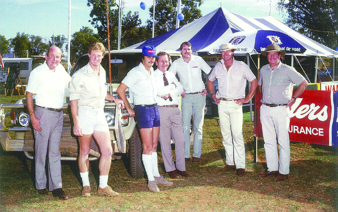 Commencing with Elders as office boy, Jack Smart rose quickly through the ranks, gaining promotions to various branch manager positions across WA, including stints as stock manager for Queensland, becoming QLD division manager in 1962 following the merger of Elders with Goldsbrough, Mort & Co. Ltd, then returning to WA as divisional manager. In 1971, he was transferred back to QLD as State manager. In 1980, Mr Smart accepted the role as State executive director of Elders west, in WA - the position he held until his retirement in 1986. Mr Smart, pictured fourth from the left, relaxes with Elders staff following the opening of the Elders Kununurra premises in the mid-1980s.
