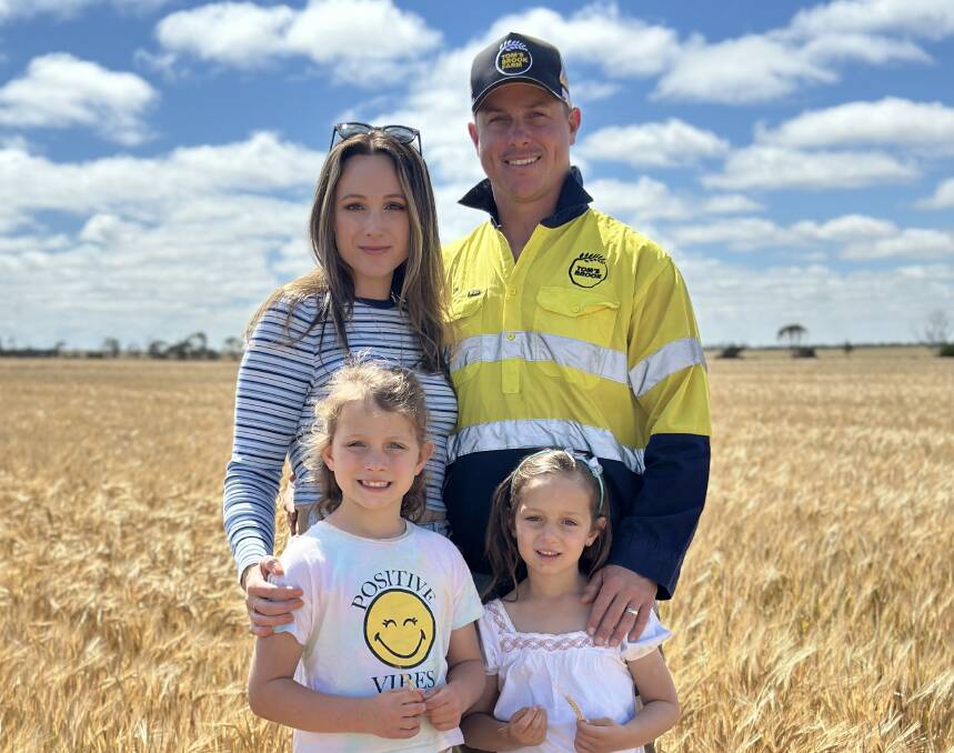 John Carmody with wife Rhiannon and daughters Felicity and Elaina at their Cascade property.
