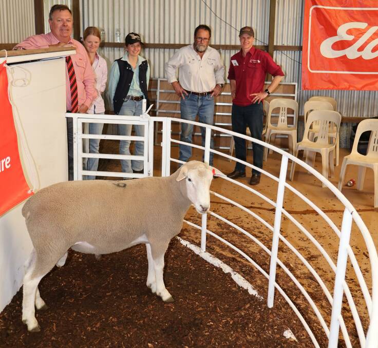 Elders auctioneer, Graeme Curry (left), with buyer Rebekah Beech, PM & SM Beech, Frankland River, friend Georgia Clingan, Inverleigh, Victoria, Mount Ronan principal Guy Bowen and buyer Sam Beech, Frankland River, with the $5000 top-priced Maternal Composite ram.