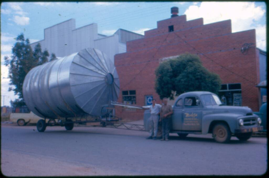 Ray Kotzur makes the first delivery of a silo in December, 1962, to the Muller family at Henty. Photo Kotzur family