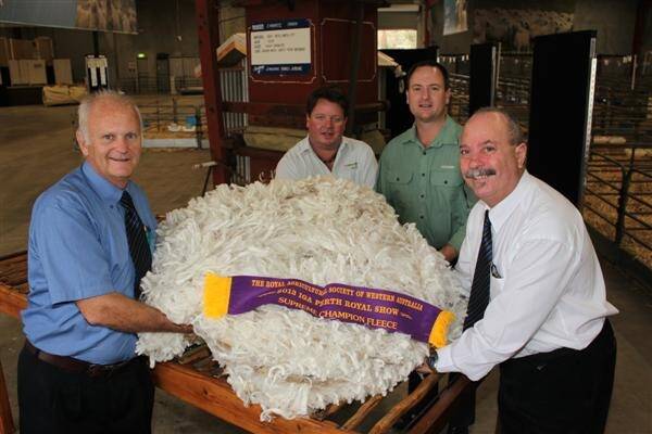 With the supreme champion fleece of this year's IGA Perth Royal Show exhibited by the Rintoul family, Auburn Valley stud, Williams, were chief wool judge Tim Chapman (left), Primaries and fellow judges Cameron Henry and Ben Silverman, Landmark and Graeme Luff, Primaries.