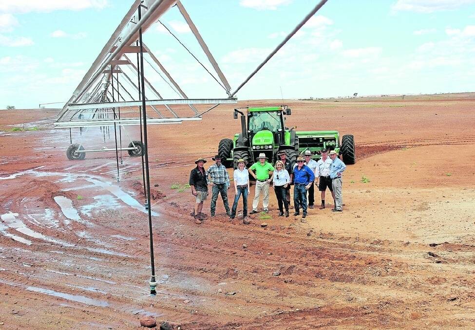 Water Minister Mia Davies (third left) and Agriculture Minister Ken Baston (far right) inspect the Woodie Woodie irrigation project on the edge of the Great Sandy Desert in March last year, soon after it started.