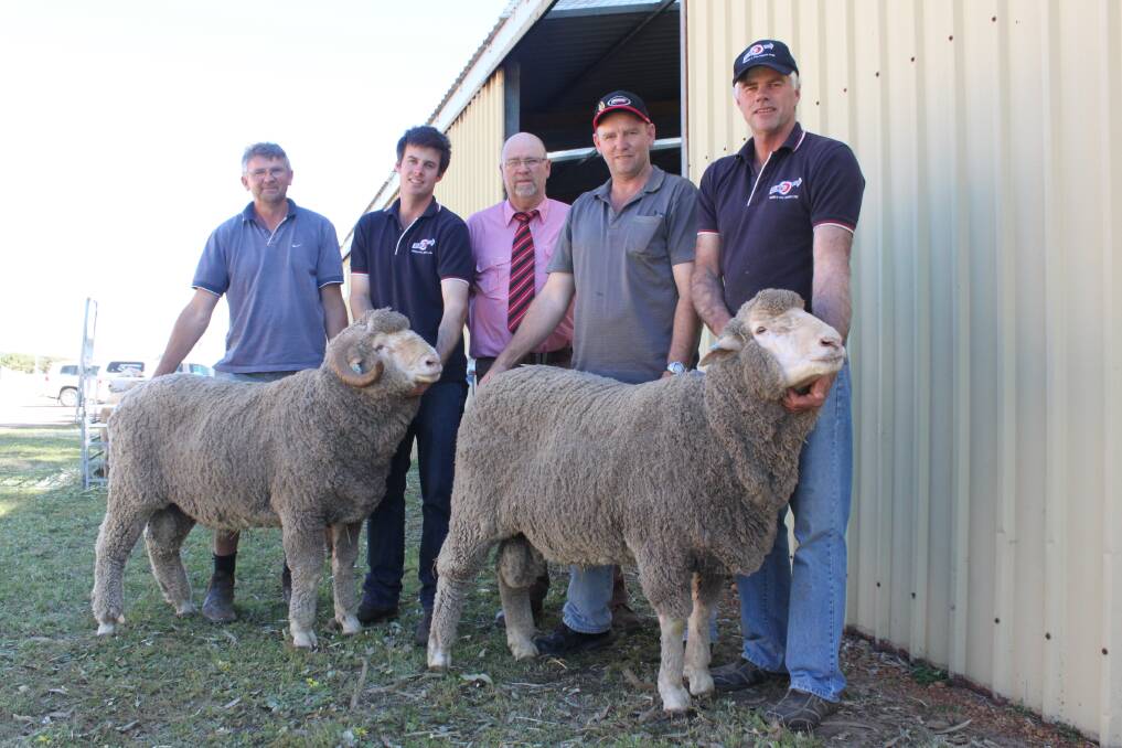 With the top-priced Merino and Poll Merino rams sold at the Kolindale Esperance ram sale on Monday to the McCrea family were Mark McCrea (left), Salmon Gums, Kolindale stud principal Luke Ledwith, Dudinin, Elders auctioneer Don Morgan, Peter McCrea, Salmon Gums and Kolindale's Matthew Ledwith, Dudinin.