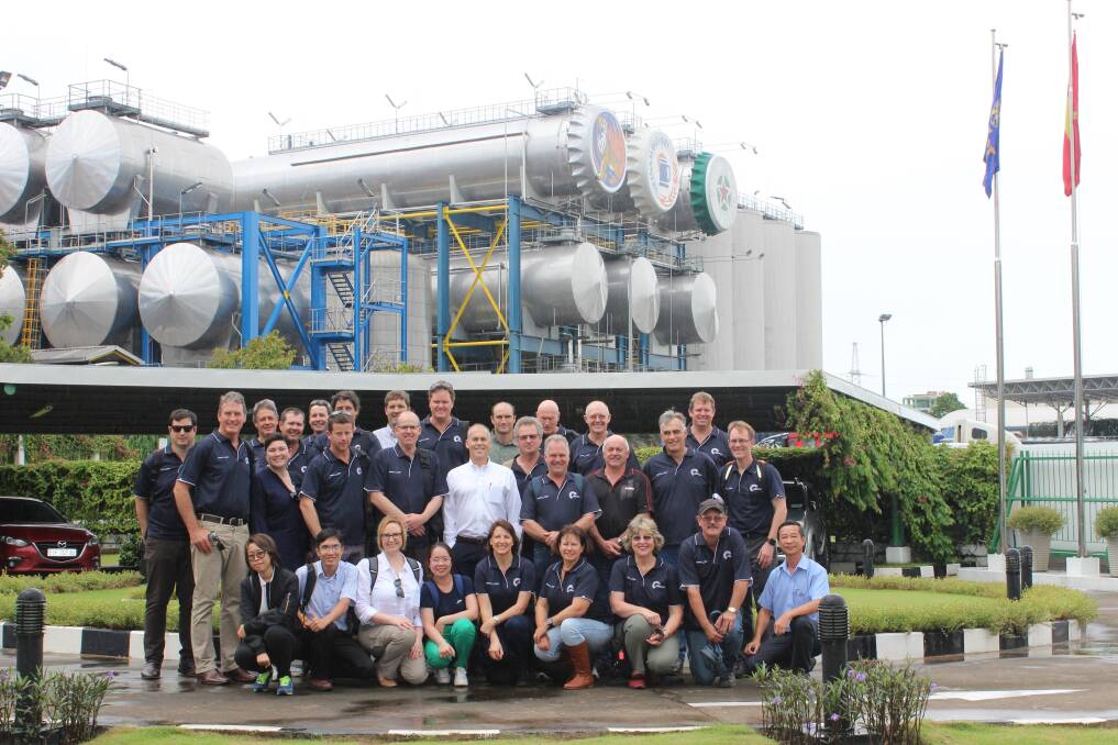 Members of the 2016 CBH grower study tour outside Heinekin's Ho Chi Minh brewery which produces 300 truck loads of Heinekin and Tiger brand beers a day using malt made from WA barley. With them is Rob Wicks (white shirt in the middle) who runs Intermalt in which CBH has a half share, Man Hoang Huu, Heinejkin supply chain support manager (front right), and some of his staff (front left).