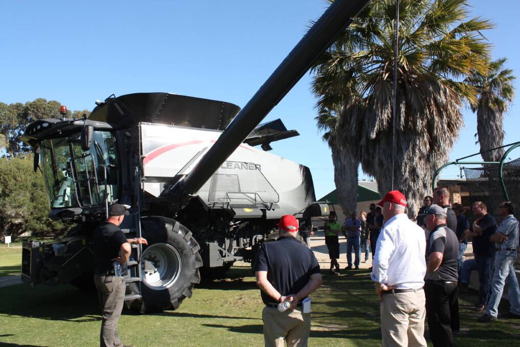 AGCO national combine product manager Shane Jardine (left) takes farmers through the features of the new Super Series S97 Gleaner combine harvester during a presentation by Geraldton AGCO dealer AgWest Machinery.