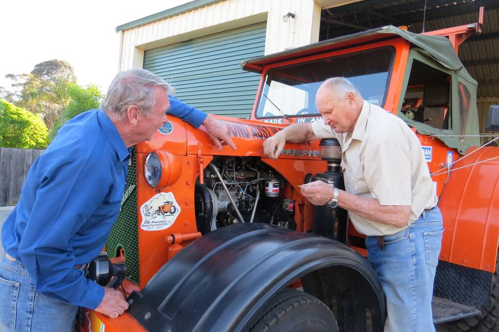 Ron Bywaters (left) and Dick Garnett start prepping Tail-end Charlie for its big road trip in 2017.