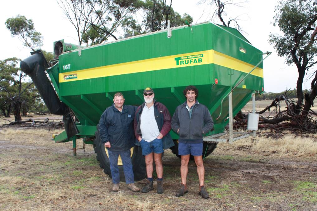Chris Payne (left), John Parsons and Peppi Cavallo with a 16 tonne Trufab chaser bin that sold for $23,000