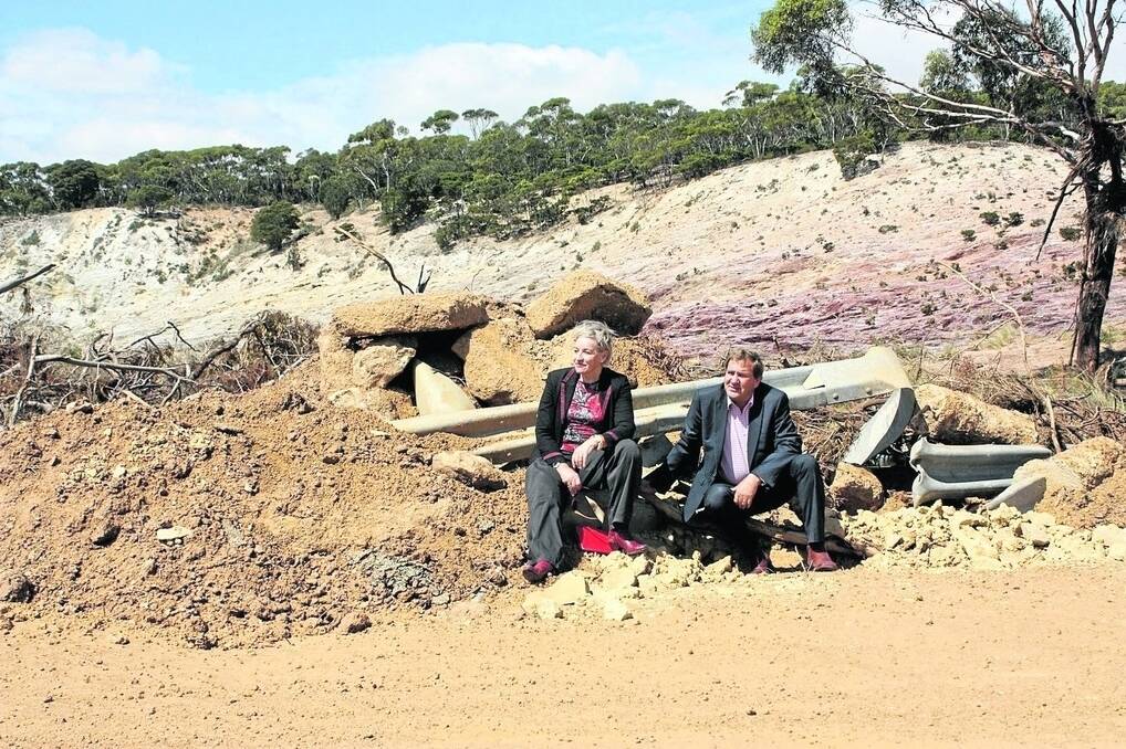 WA Agriculture and Food Minister Alannah MacTiernan and parliamentary secretary Darren West inspect the damage after the Jerdacuttup River, north of Ravensthorpe, broke its banks and damaged roads and surrounding property.