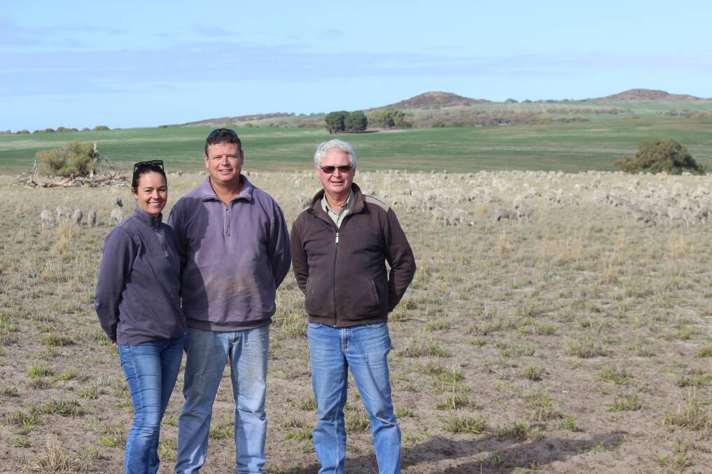 Their paddocks are usually greener than this in July but sticking it out with Merinos has been worth it for Cathy, Ashley and Robert Auld, Eneabba.