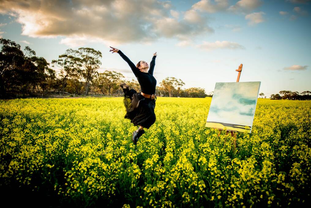 Farmer, artist and former dancer Nyree Taylor and one of the pieces from her Exhale collection in a crop of Bonito canola. Photo by Erin McPherson.