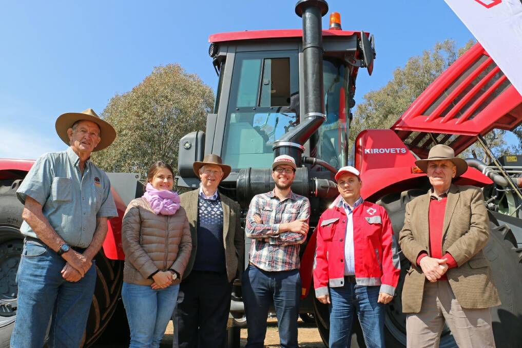  The Russians are seeking a piece of the Australian tractor market and quietly launched a high horsepower 4WD model at the recent Henty Machinery Field Days, New South Wales. A Torque operative captured this pic of Peter Woods (left), Albury, NSW, Anna Kovaleva, Russia, Ross McDonald and Alex Milne, Melbourne, Victoria, Andrey Sagaev, Kirovets head service manager and Craig Milne, Melbourne in fro