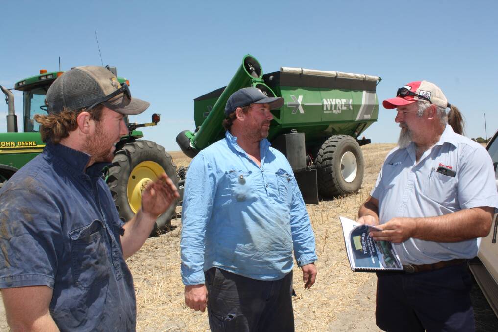  Dowerin farmers Kane Ralph (left) and his father Graham with Boekeman Machinery salesman Leith Johnson, Dowerin.