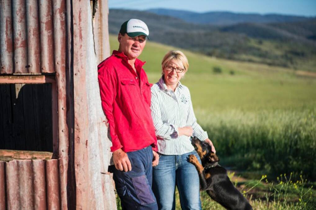 Wool farmer Mark McGufficke with wife Karen at their farm near Cooma, New South Wales. Photo: Charles Davis.