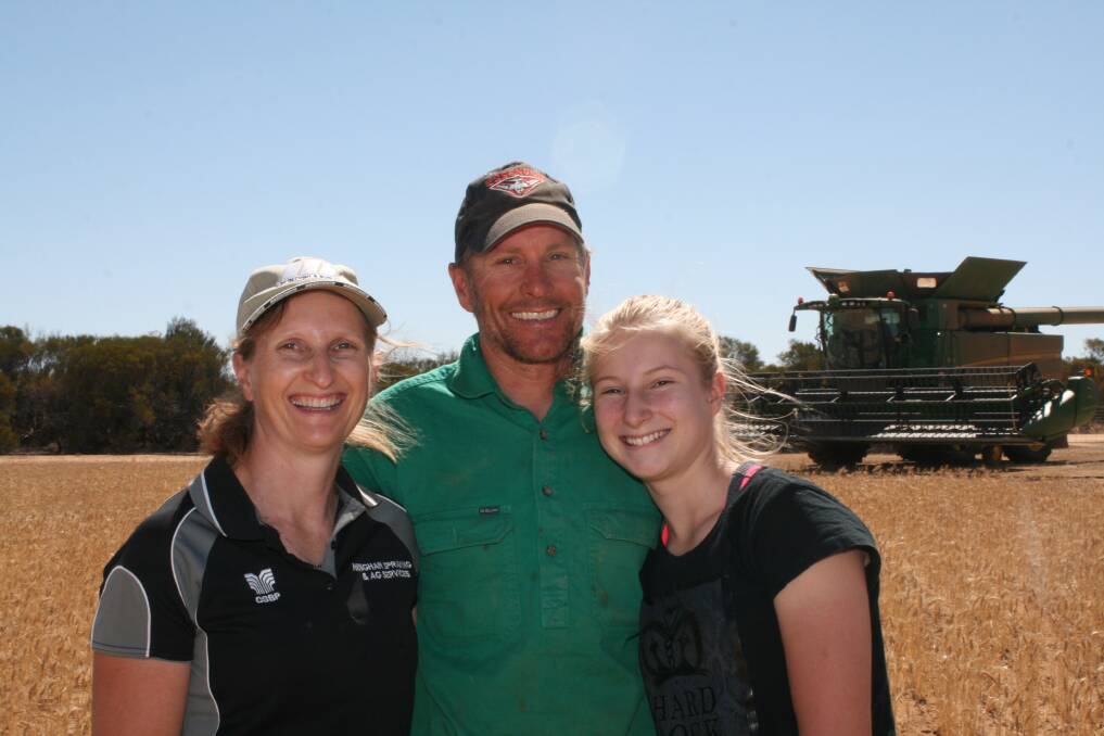 The Kirby family embrace showing high hopes in a tough time with Rachel (left), Ty and Anastasia on their farm at Beacon.
