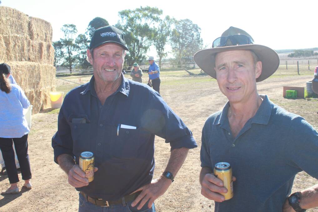Enjoying a cold beverage after the Lawsons Angus Albany yearling bull sale were bull buyers Brendan Hulcup (left) and Glen Ryan, both of Quinninup.
