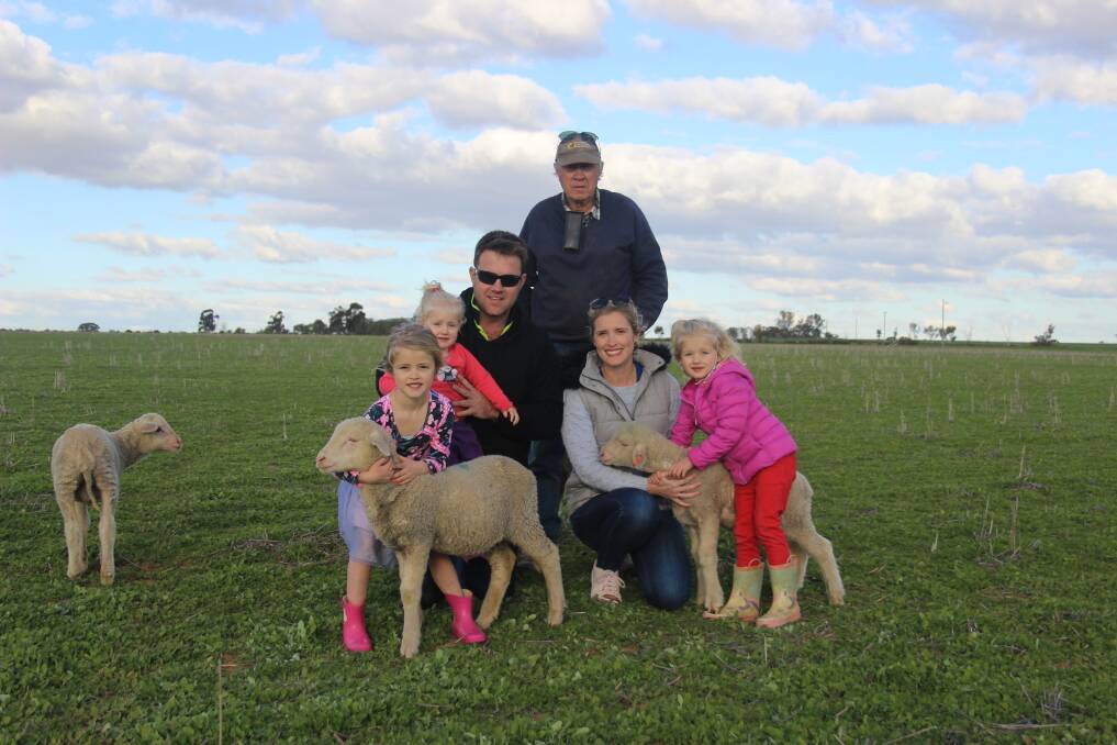 Burakin farmer Trevor Johnson (rear) with son Brett and daughter-in-law Sarah Johnson and their children Kiara (left), Indi and Zoey.