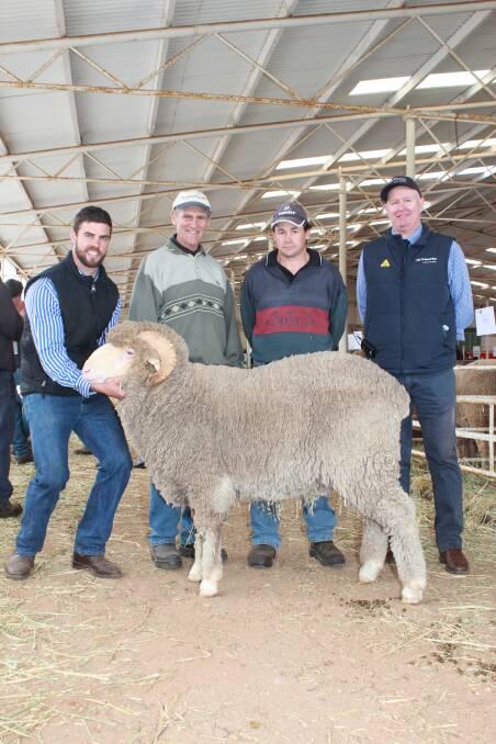With the $4000 top-priced Wililoo Merino ram and the top price ram of the Wagin Breeders’ Ram Sale overall were Wililoo stud co-principal Rick Wise (left), Woodanilling, buyers Cyril and Vance Blechynden, Brookton and Primaries auctioneer Mark Mahney.