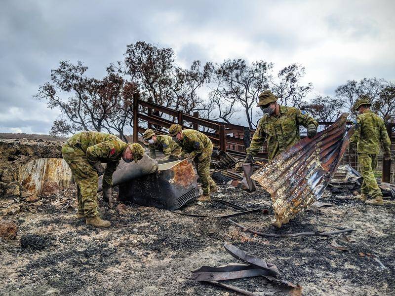 Calling on defence forces to help with disaster recovery is not a long-term solution, a review says. (EPA PHOTO)