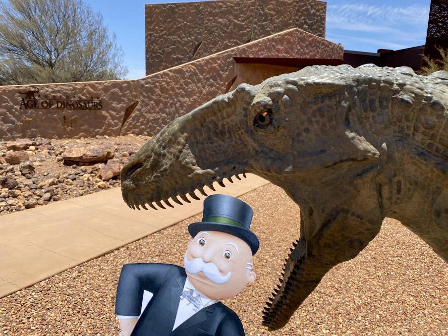 Monopoly man meets dinosaurs in Winton.