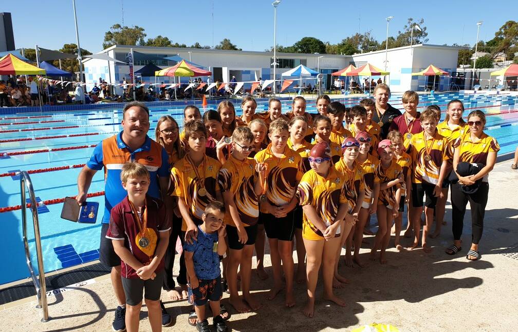 Super start: Swimmers with para-Olympian Joshua Hofer OAM at the new facilities' first big competition. Photo: Supplied.