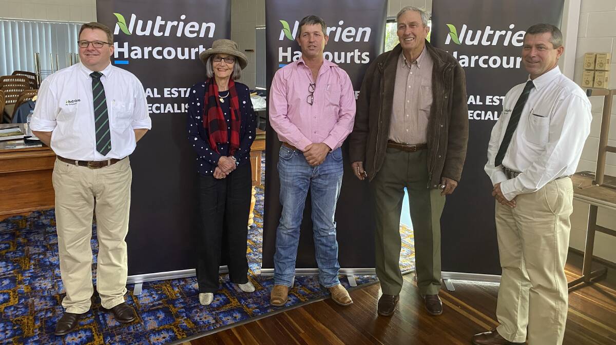 GAINSES STATION: Auctioneer Tony Bowen Nutrien Harcourts, vendor Pat Wakeford, buyer Jack Mann, vendor Dick Wakeford, and marketing agent David Woodhouse, Nutrien Harcourts.