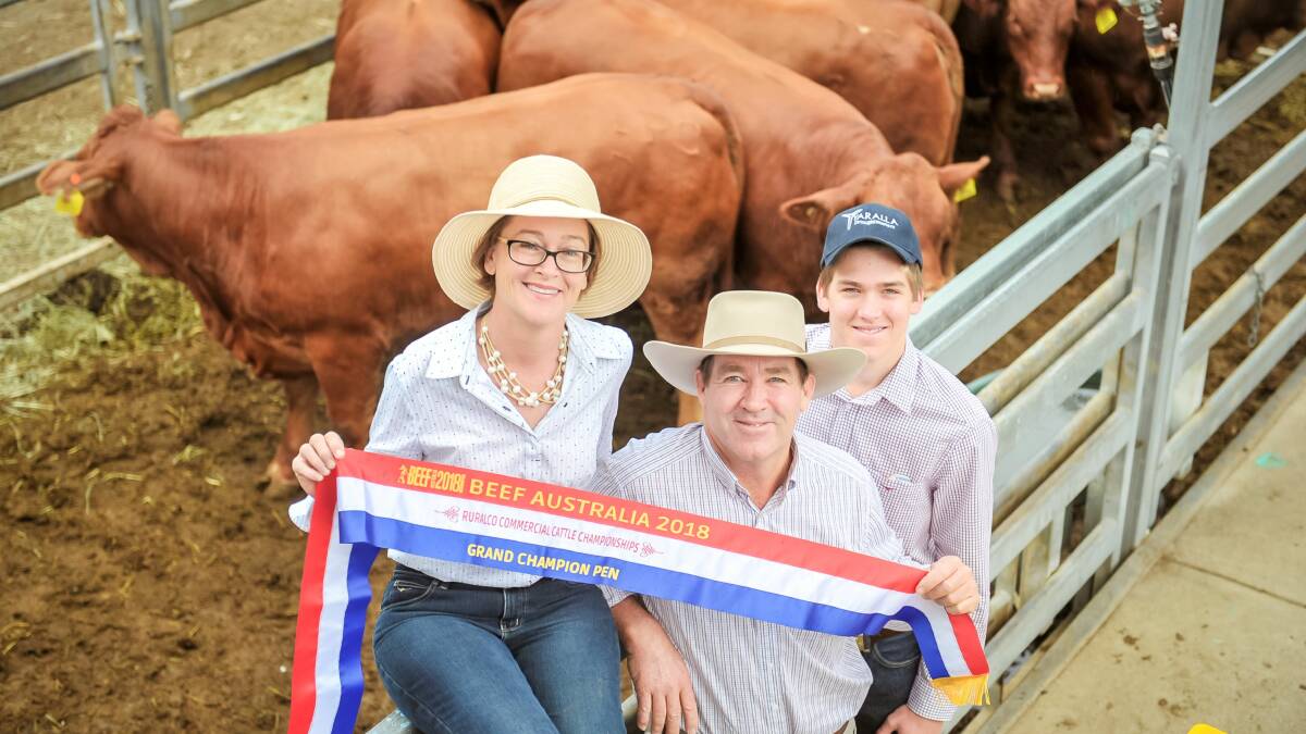 BETTER BEEF: Kerry, Ken and Thomas McKenzie, Yaralla Droughtmasters, Blackwater, with their award-winning heifers, named the overall champion pen at Beef 2018.